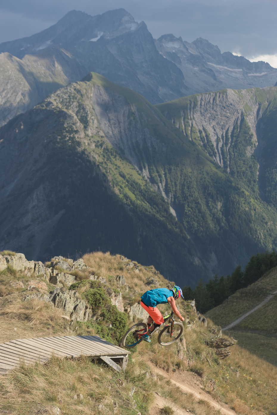 Man with mtb jumping off ramp